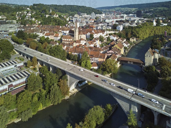 View of the old town, in front the high bridge, behind the covered wooden bridge with the Landvogteischloss on the river Limmat, Baden, Canton, Aargau, Switzerland