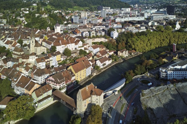 View of the old town with the parish church of Maria Himmelfahrt, in the background the ruins of Stein Castle, formerly an administrative centre of the Habsburgs, on the right the river Limmat and the covered wooden bridge with the Landvogteischloss, Baden, Canton, Aargau, Switzerland