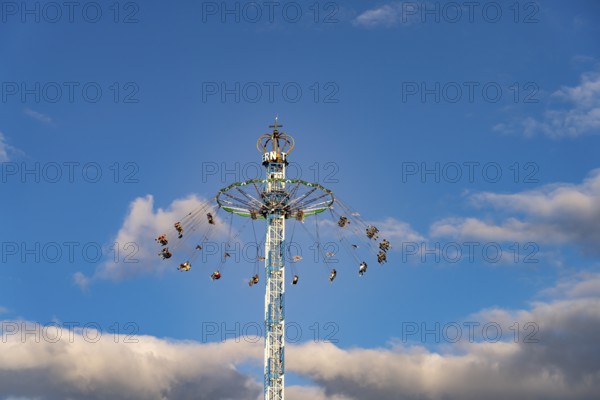 High-chain carousel Bayerntower at the Oktoberfest 2024 in Munich, Bavaria, Germany