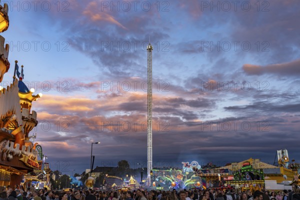 Oktoberfest 2024 at dusk, Munich, Bavaria, Germany