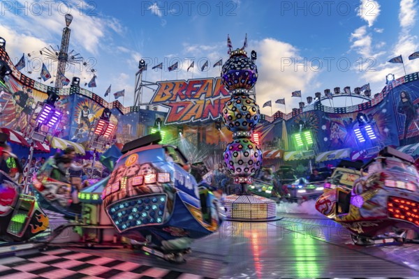Carousel breakdancing at the Oktoberfest 2024 in Munich, Bavaria, Germany