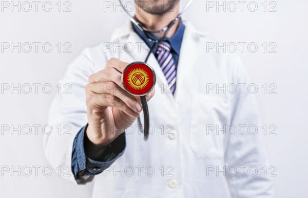 Kyrgyzstan healthcare system, doctor holding stethoscope. Kyrgyzstan health and medical insurance concept