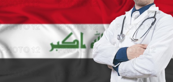 Iraq healthcare concept. Male doctor on Iraq flag. Doctor with crossed arms on Iraq flag