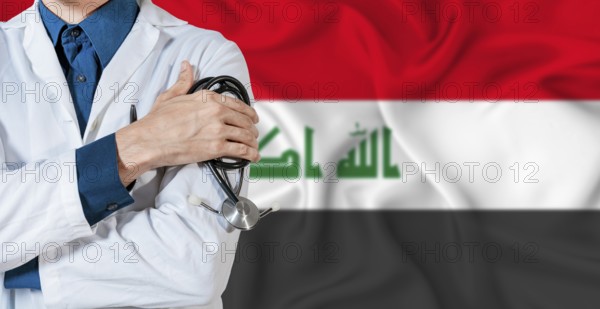 Doctor with stethoscope on Iraq flag. Doctor holding stethoscope on Iraq flag
