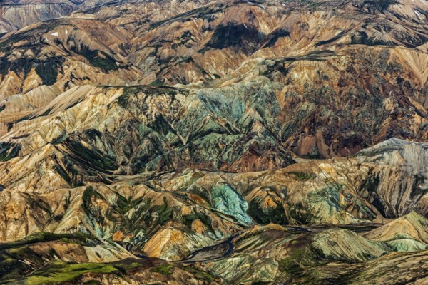 Mountain landscape, snowfields, sunny, summer, volcanic landscape, aerial view, ryolite rock (green), Landmannalaugar, Fjallabak Nature Reserve, Icelandic Highlands, Iceland