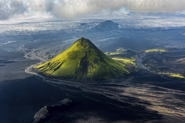 Mountain landscape, sunny, summer, volcanic landscape, river bed, river, aerial view, backlight, Maelifell volcano, Maelifellssandur, behind it Myrdalsjökull glacier, Icelandic Highlands, Iceland