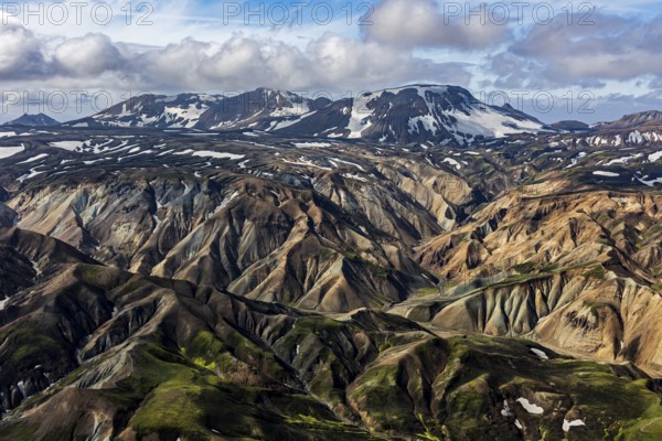 Mountain landscape, sunny, summer, snowfields, volcanic landscape, aerial view, Landmannalaugar, Fjallabak Nature Reserve, Icelandic Highlands, Iceland