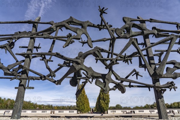 Monument Skeletons in the barbed wire by the Jewish sculptor Nandor Glid, Dachau Concentration Camp Memorial, Bavaria, Germany