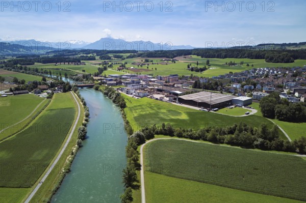 River Reuss right view of the village with the industrial area, Sins, Freiamt, Canton, Aargau, Switzerland