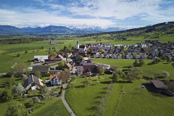 View of the village, behind the Rigi and the snow-covered Alps, Beinwil, Freiamt, Canton, Aargau, Switzerland