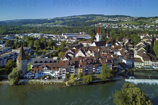 Old town with the Catholic Church of St Nicholas and the witches' tower, in the foreground the weir and the river Reuss, Bremgarten, Freiamt, Canton, Aargau, Switzerland