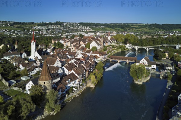 Old town with the Catholic Church of St. Nicholas, the tower of the Muri- Amthof and the witches' tower, on the right the museum Reusskraftwerk Bruggmühle and the old wooden bridge over the river Reuss, Bremgarten, Freiamt, Canton, Aargau, Switzerland