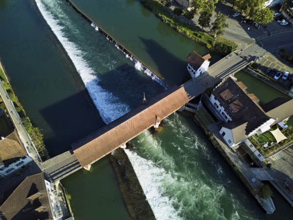 Old wooden bridge from above with the weir on the river Reuss, Bremgarten, Freiamt, Canton, Aargau, Switzerland