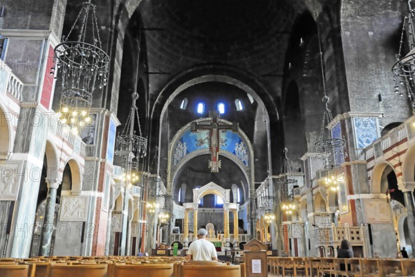 Westminster Cathedral, London, England, Great Britain, Europe, Dark church interior with high vaults, benches and decorative lighting, London region