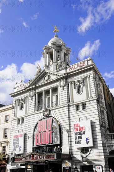 London, England, Great Britain, Europe, Classic theatre building with eye-catching lettering and decorations under a blue sky