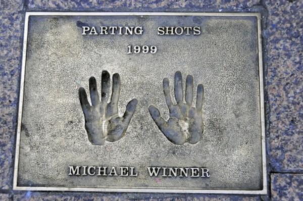 Memorial plaque with handprints and inscription for Michael Winner from 1999, London, England, Great Britain