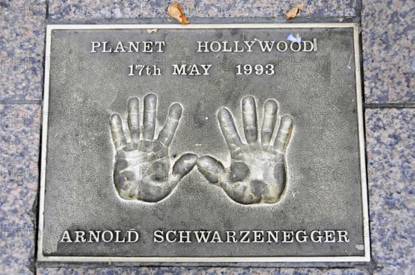 Metal plate with handprints and the inscription of Arnold Schwarzenegger, Planet Hollywood 1993, London, England, Great Britain
