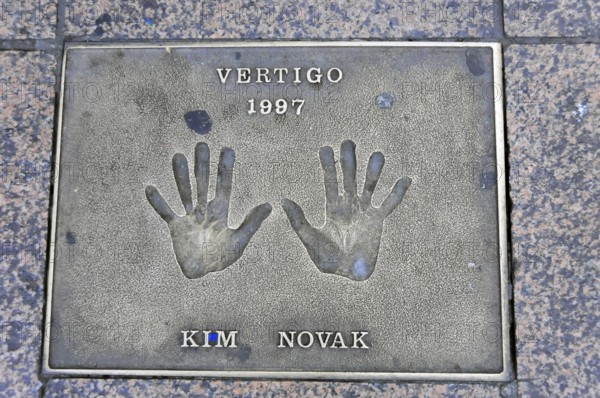 Memorial plaque with handprints and inscription for Kim Novak from 1997, London, England, Great Britain