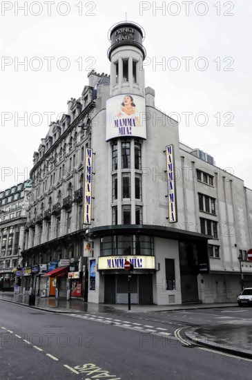 London, England, Great Britain, Europe, A building with a large Mamma Mia poster standing on an empty street