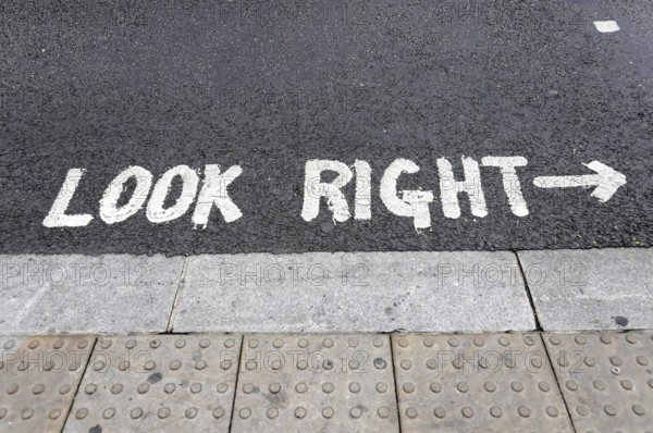 London, England, Great Britain, Europe, sign on the street with the inscription 'Look Right' in white colour
