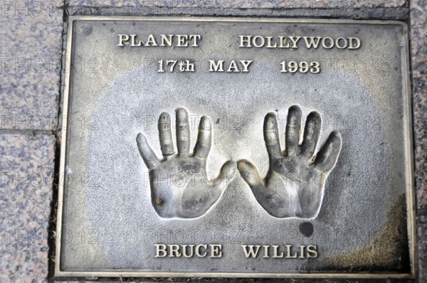 Handprints of Bruce Willis on a pavement slab from 1993, London, England, Great Britain