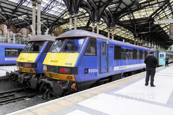 Interior view of Liverpool Street station, London, England, Great Britain, Blue trains on the platform in the station, ready for departure, London, England, Great Britain