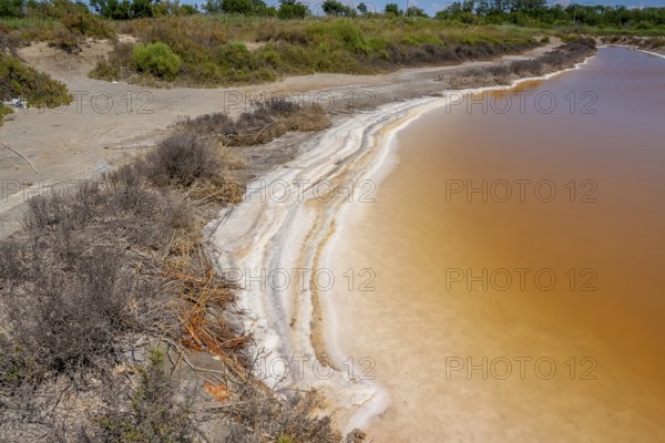Scenery around Salin-de-Giraud located in in the Camargue area in southern France wich is showing lots of salt evaporation ponds in sunny ambiance