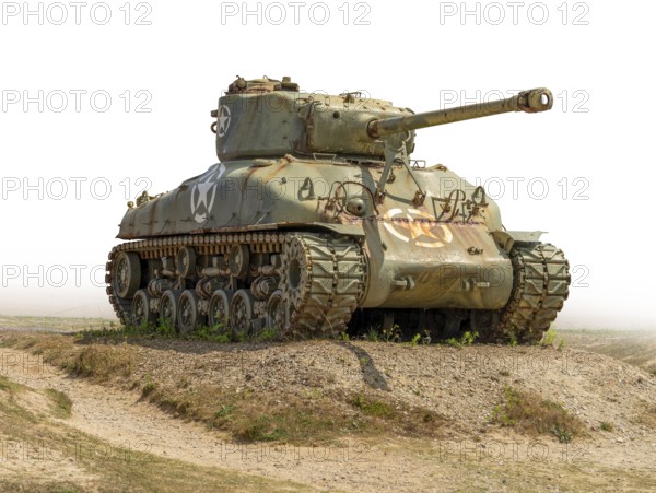 Historic tank at Utah Beach which was one of the five areas of the Allied invasion of German-occupied France in the Normandy landings on 6 June 1944, gradient isolated in white back