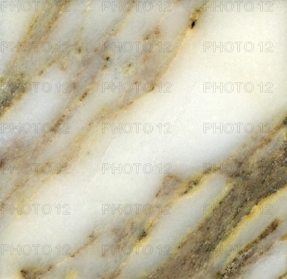 Abstract full frame background showing a light marbled polished stone structure