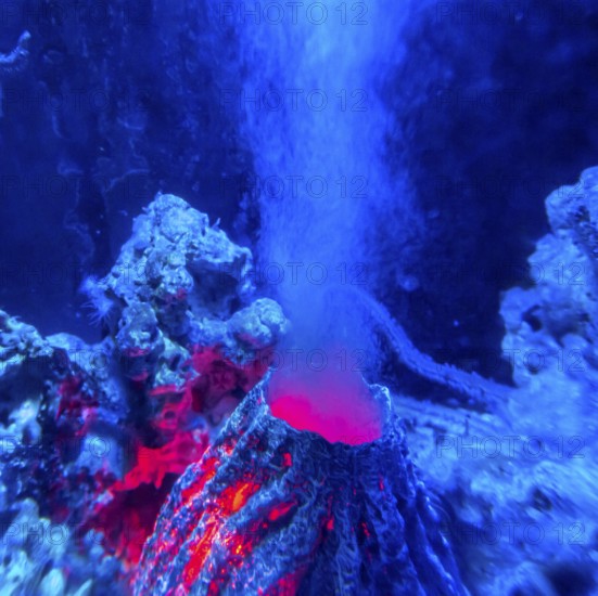 Brightly illuminated artificial underwater volcano
