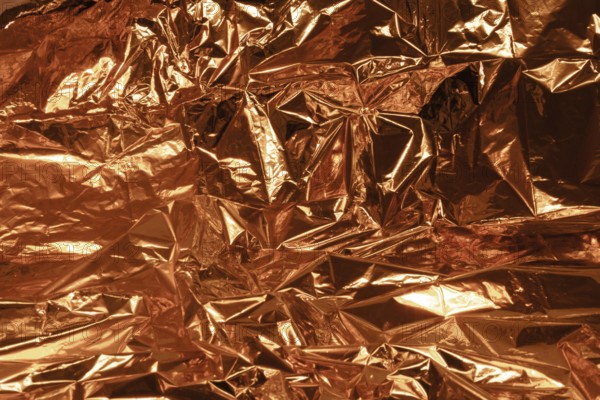 Full frame creased copper foil background