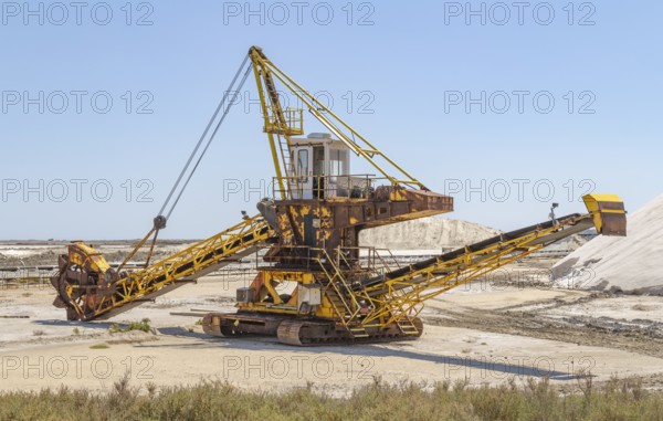 Bucket-wheel excavator near a salt production facility around Salin-de-Giraud located in in the Camargue area in southern France