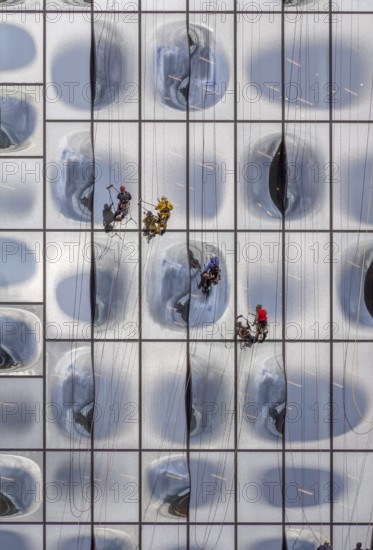 Window cleaners at the Elbphilharmonie facade in Hamburg, Germany