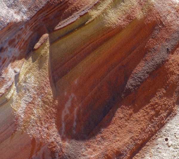 Detail of a a colorful rock formation in the Libyan Desert
