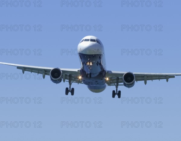 Low angle shot of a flying aeroplane