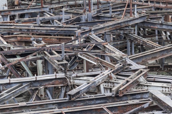 Weathered rusty industrial scenery with lots of old corroded steel girders