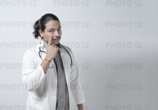 Suspicious doctor watching you on isolated