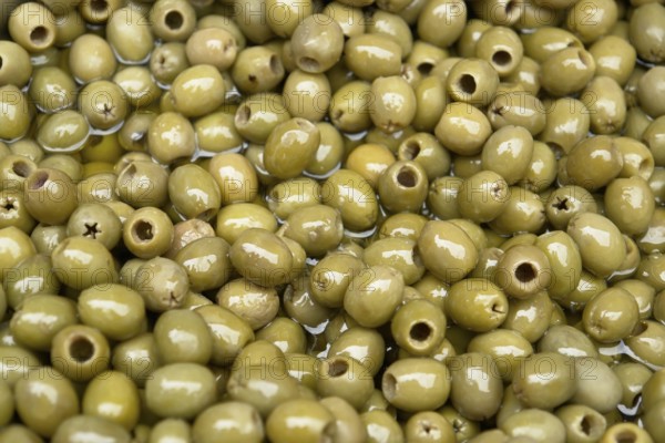 Lots of pickled green olives
