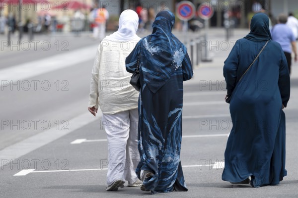 Women with headscarves, Interlaken, Switzerland