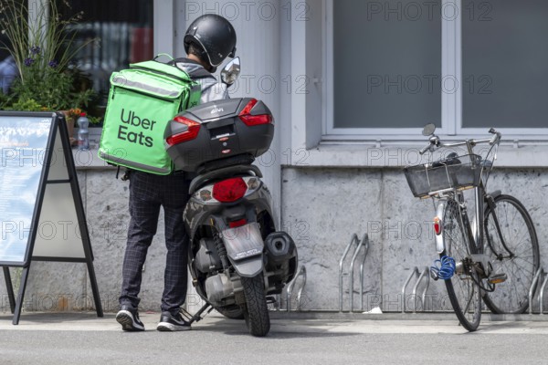 Uber Eats motorbike courier, Interlaken, Switzerland