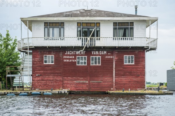 Wooden house, old shipyard in Leiden, Holland