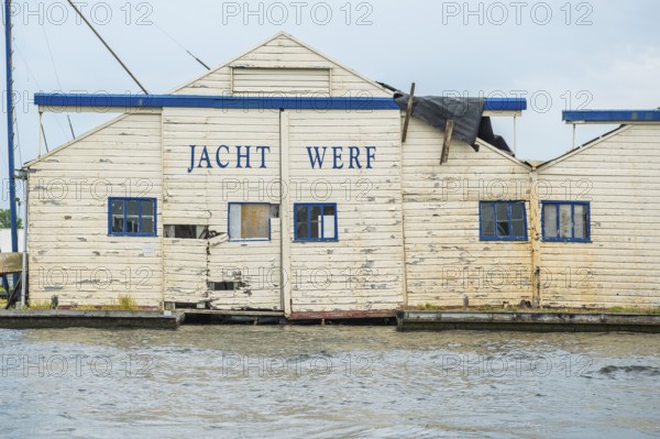 Wooden house, old shipyard in Leiden, Holland