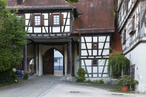Monastery complex, archway, half-timbered house, Blaubeuren, Swabian Alb, Baden-Württemberg, Germany