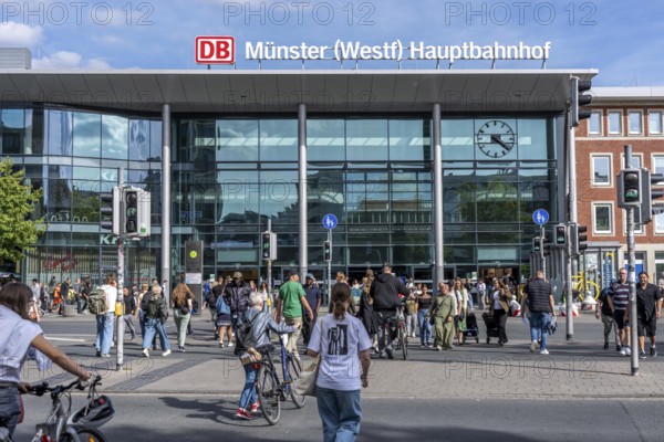 Station forecourt of the main railway station in Münster, pedestrian crossing over Bahnhofstraße, North Rhine-Westphalia, Germany