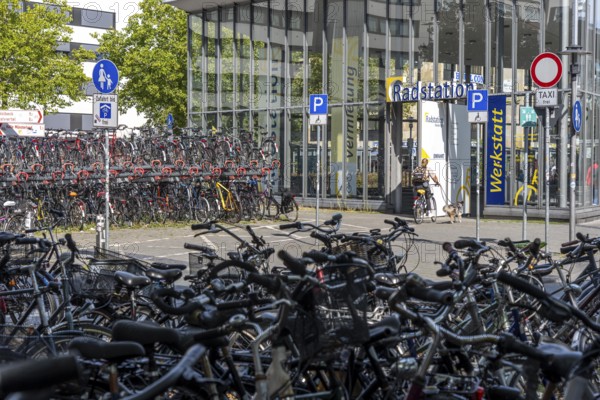 Cycling in Münster, large bicycle parking area in front of Münster main station, bicycle station, bicycle parking garage, North Rhine-Westphalia, Germany, city centre of Münster, North Rhine-Westphalia, Germany