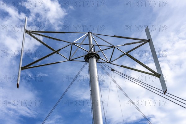 Vertical axis wind turbine, Darrieu wind turbine, 2 vertically mounted rotors rotate around the axis, near Darup in Münsterland, North Rhine-Westphalia, Germany