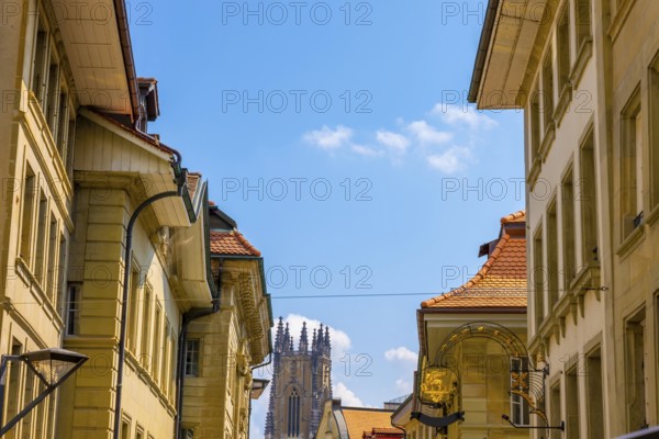 Cityscape with Cathedral Tower in a Sunny Summer Day in City of Fribourg, Canton Fribourg, Switzerland