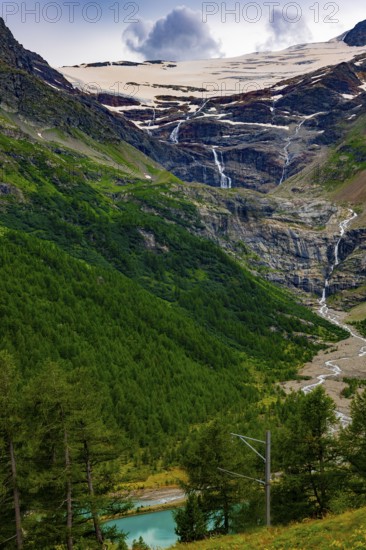 Beautiful Mountain Alp Grüm with Glacier and Alpine Lake Palü in the Swiss Alps in a Sunny Cloudy Summer Day in Poschiavo, Bernina, Grisons, Switzerland