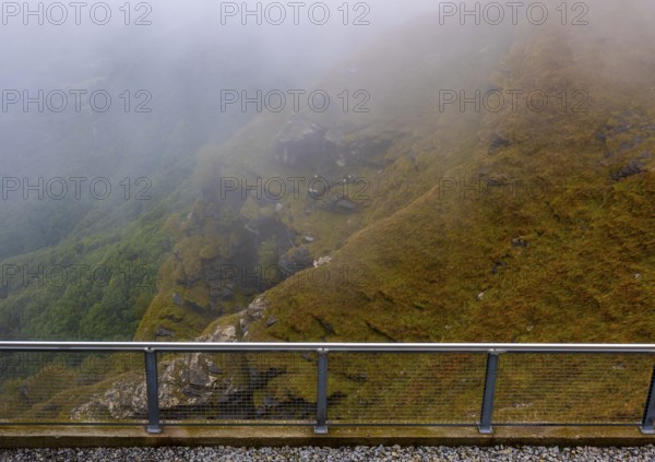 Mountain View Fom a Terrace in the Clouds in a Cloudy Autumn Day in Monte Generoso, Ticino, Switzerland