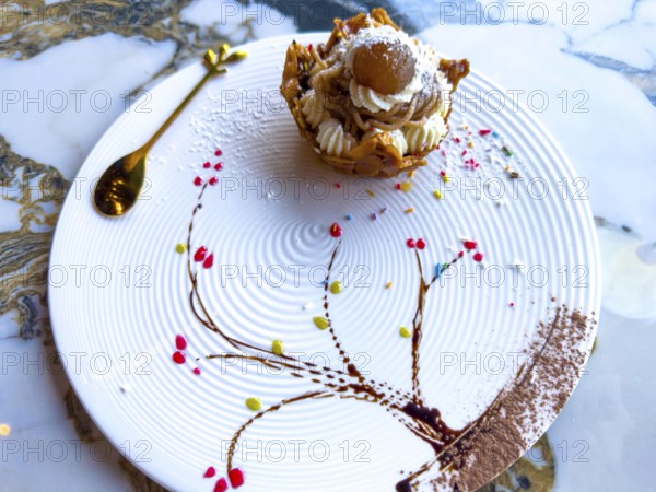 Beautiful Sweet Dessert Vermicelli on an Elegant Decorated Plate in a Restaurant in Italy